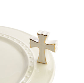 Nora Fleming Cross hand-painted mini on ceramic base, ideal for seasonal home decor