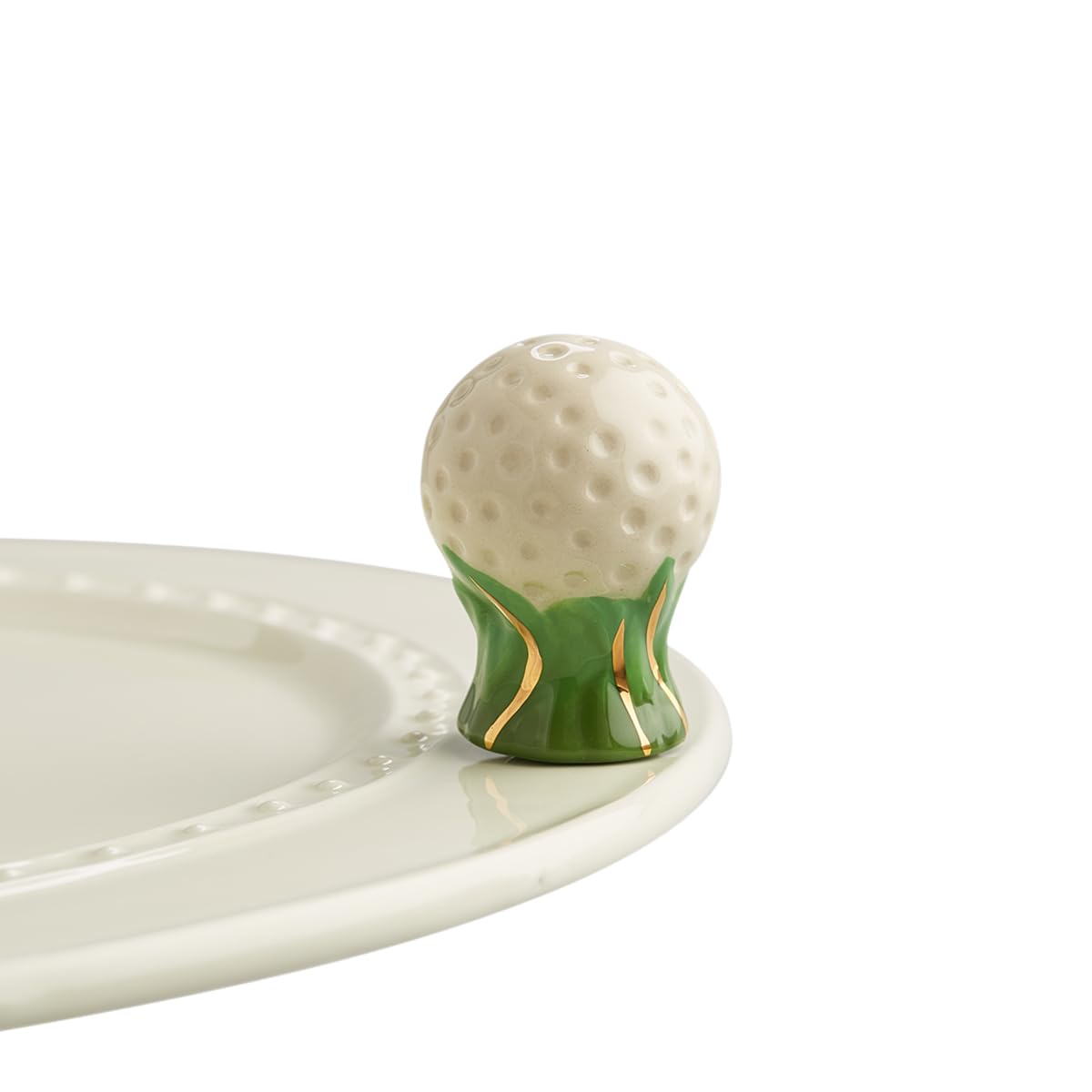 Nora Fleming Hole in One golf ball mini on a tee for festive decor.
