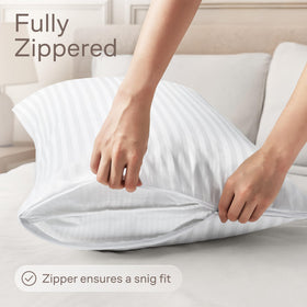 Soft cotton-polyblend texture visible on a pillow protector surface.