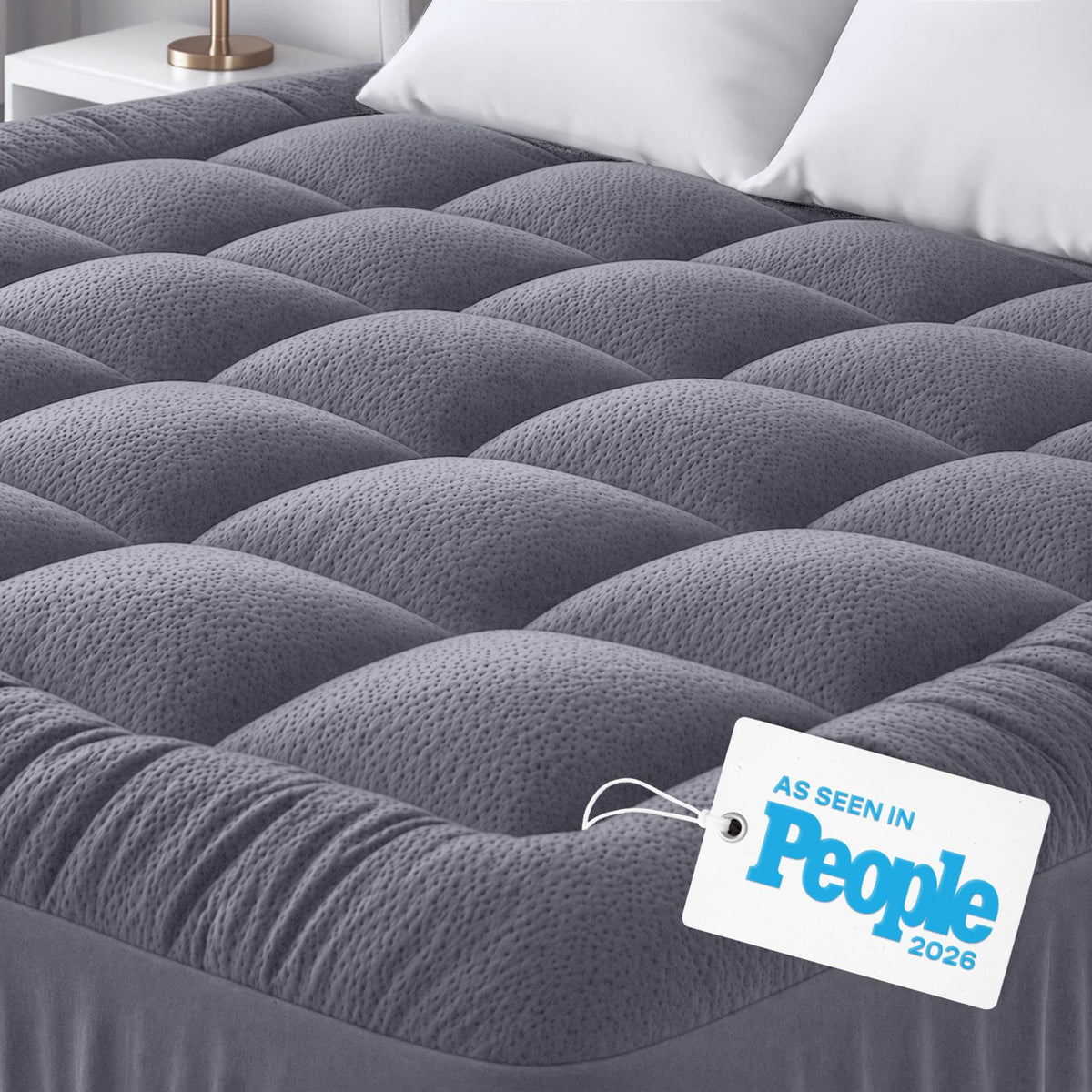 Niagara Sleep Solution Ultra Soft Full XL topper on a pillow-top bed, cloud-like cushioning.