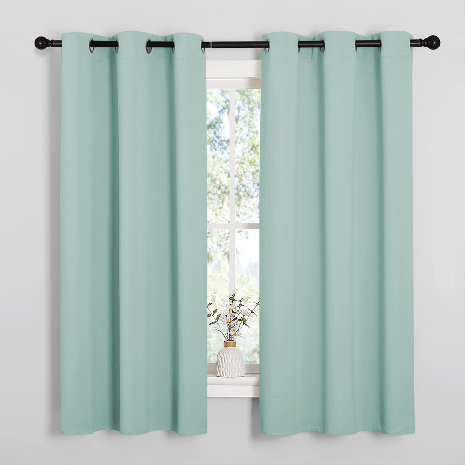 NICETOWN Aqua Blue room darkening curtains with two panels for privacy and light control.