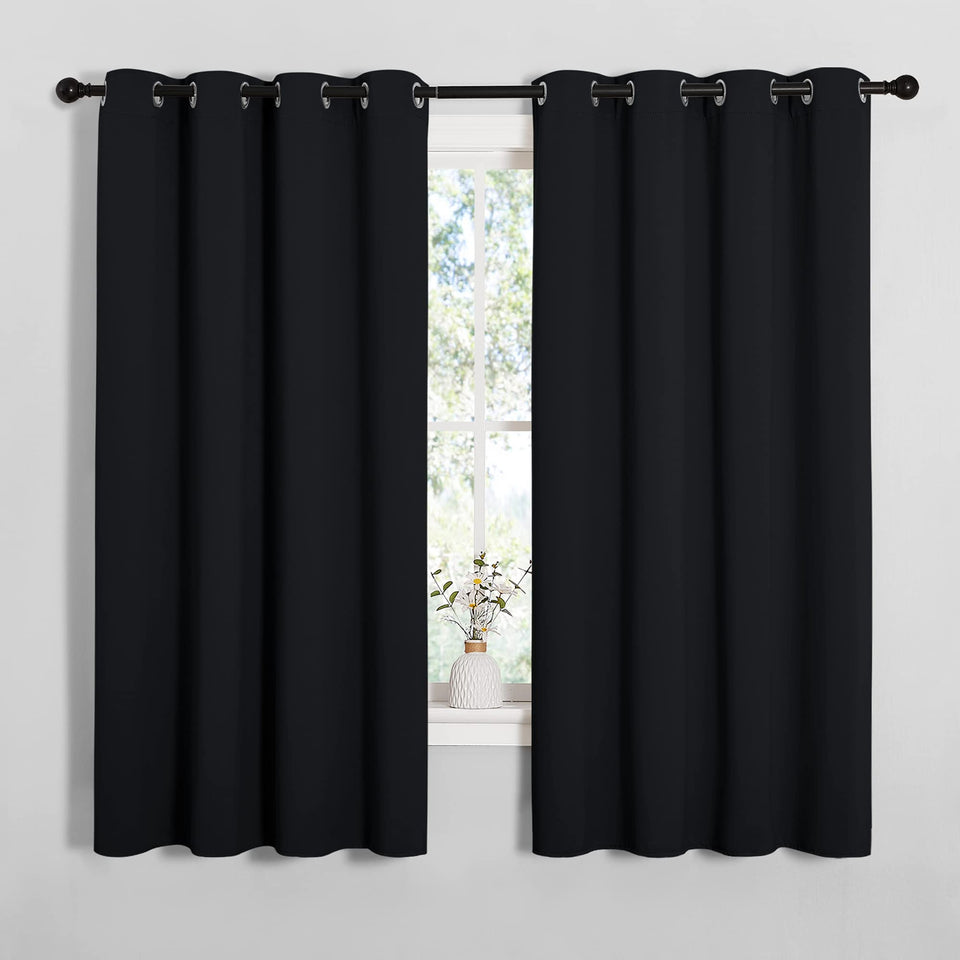 NICETOWN blackout curtains with two panels for privacy and light control.