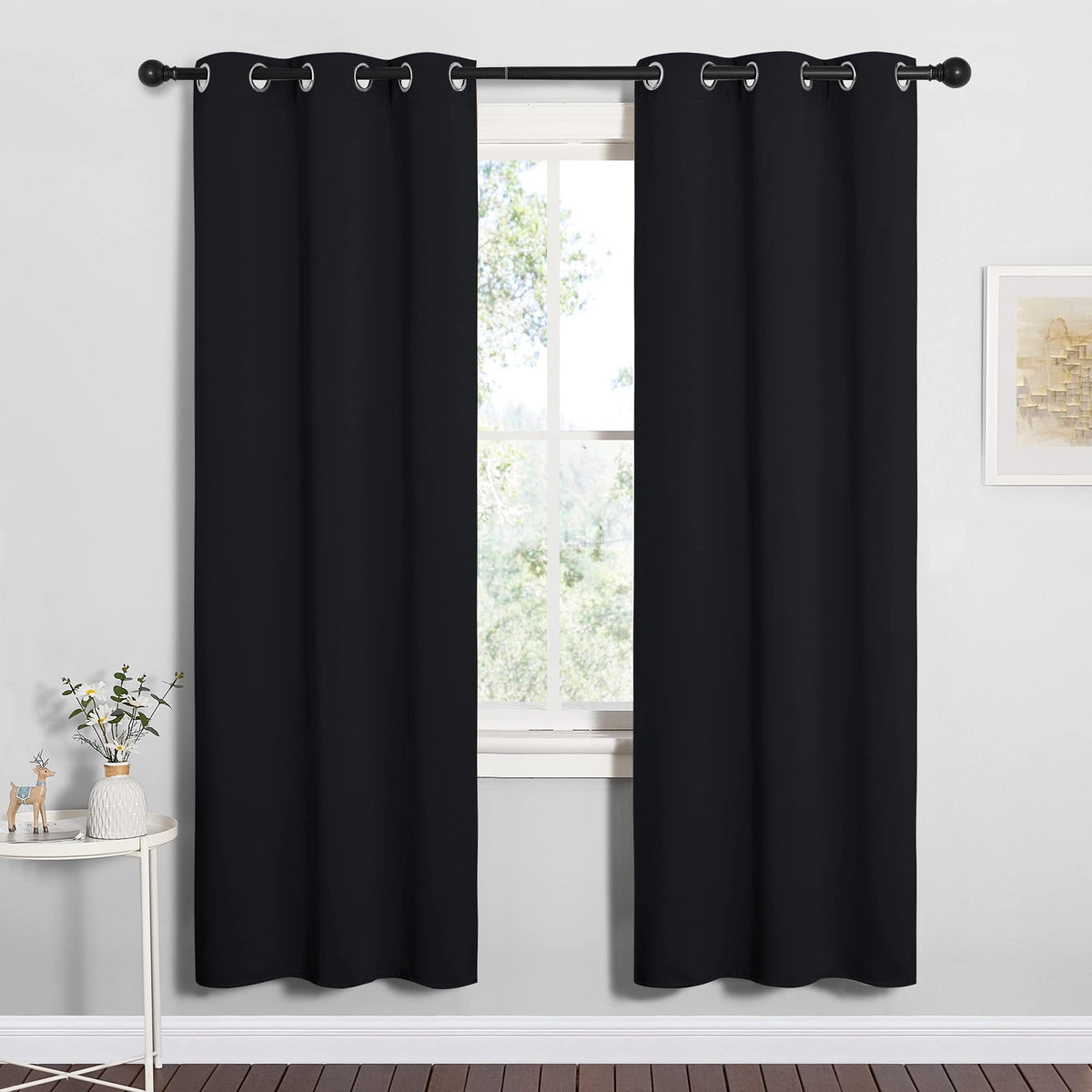 NICETOWN blackout curtain detail showing silver grommet for smooth sliding