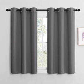 NICETOWN bedroom blackout curtains with silver grommets block light for restful mornings.