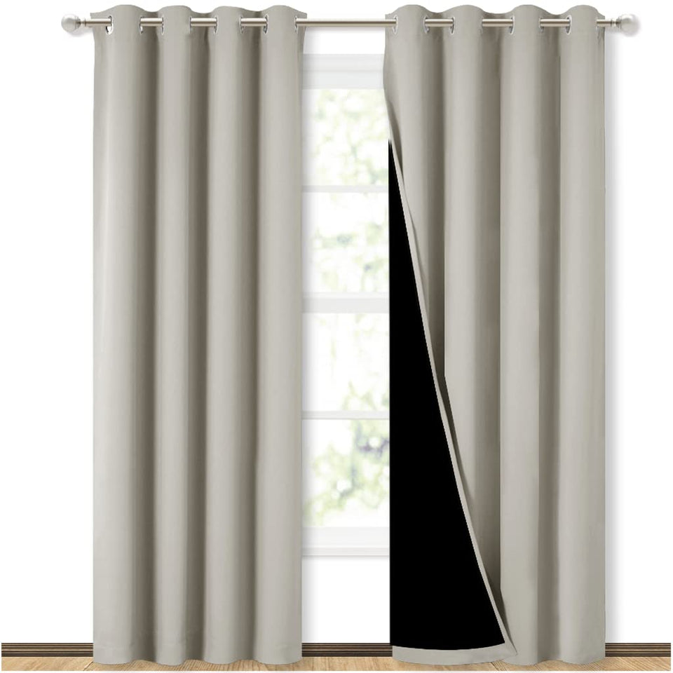 NICETOWN blackout curtain panel on rod with silver grommets for smooth sliding and style