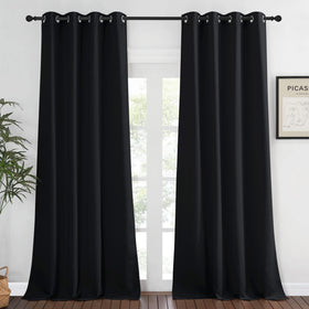 NICETOWN blackout curtain front view with grommets blocks light for privacy.