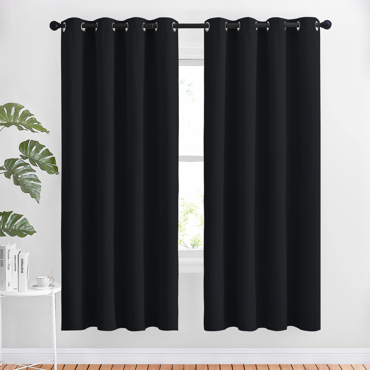 NICETOWN blackout curtain panel with silver grommets blocks light for living room and enhances privacy