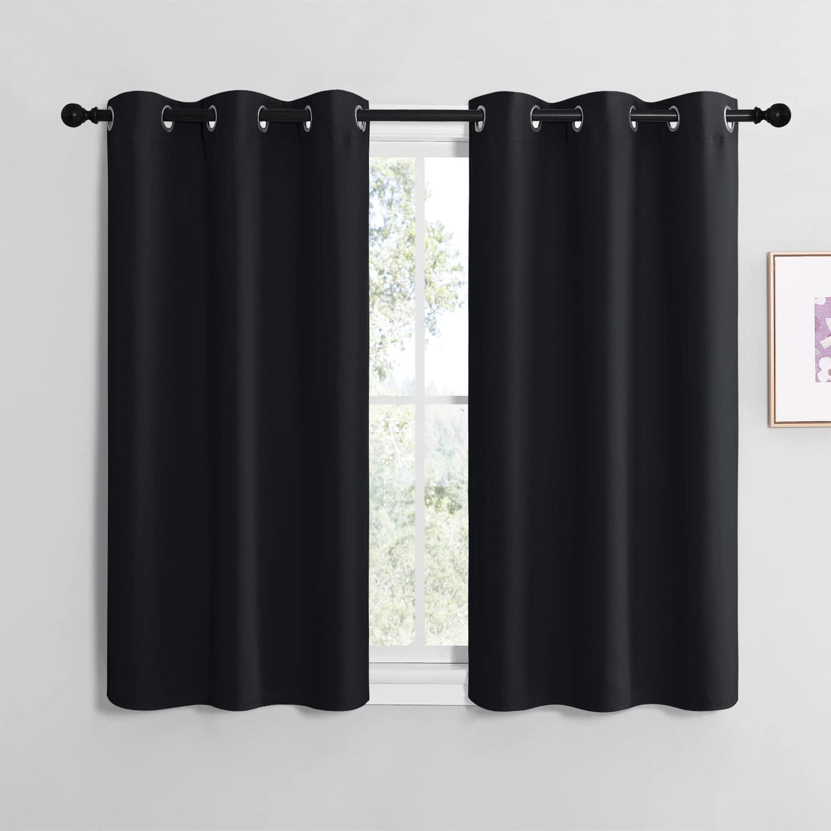 NICETOWN blackout curtain panels block light for a restful bedroom