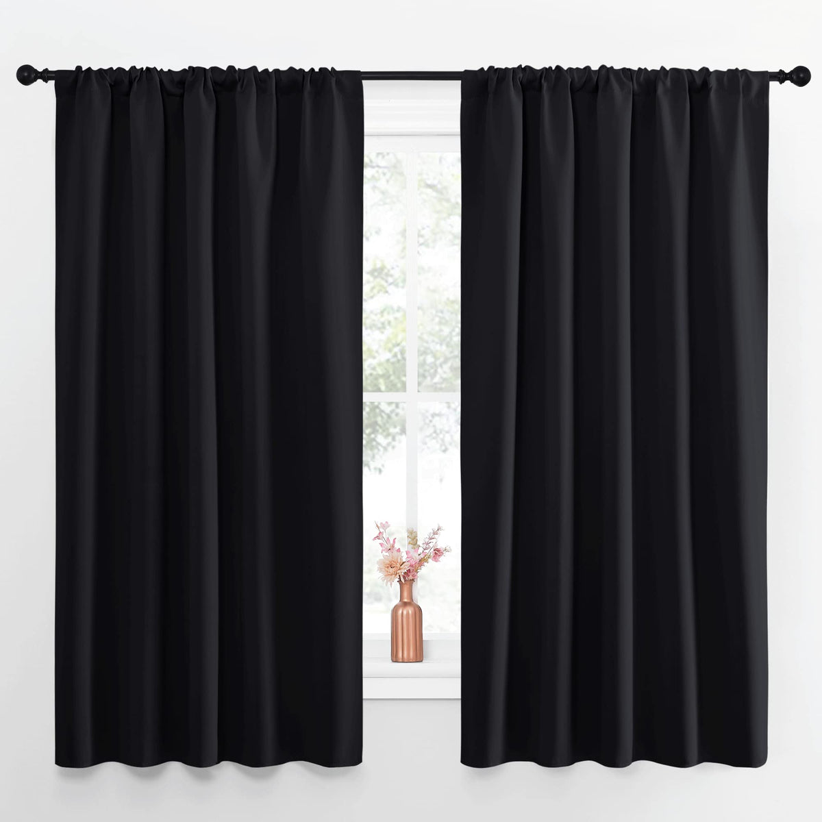 NICETOWN blackout curtains with rod pocket for easy installation and improved sleep.