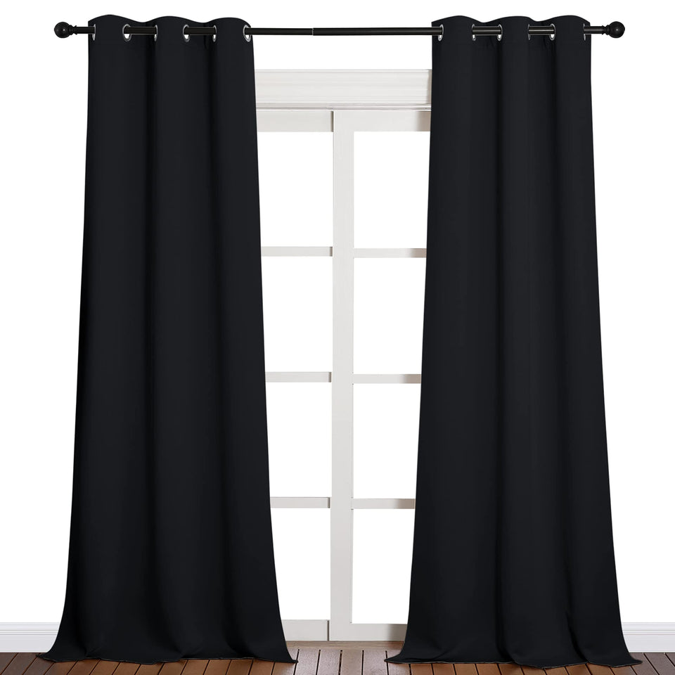 NICETOWN blackout curtains 42x90 set with six grommets blocks light for better TV viewing.