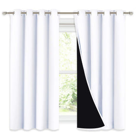 NICETOWN blackout curtain panel close-up of the grommet for easy installation and privacy.