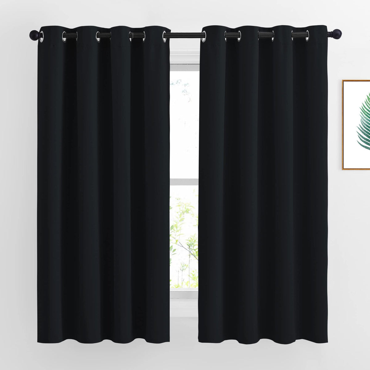 NICETOWN burgundy blackout curtains closeup fabric showing strong light blocking.