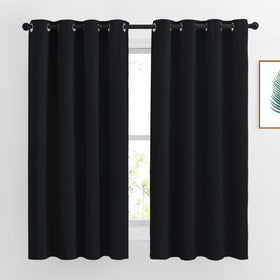 NICETOWN burgundy blackout curtains closeup fabric showing strong light blocking.