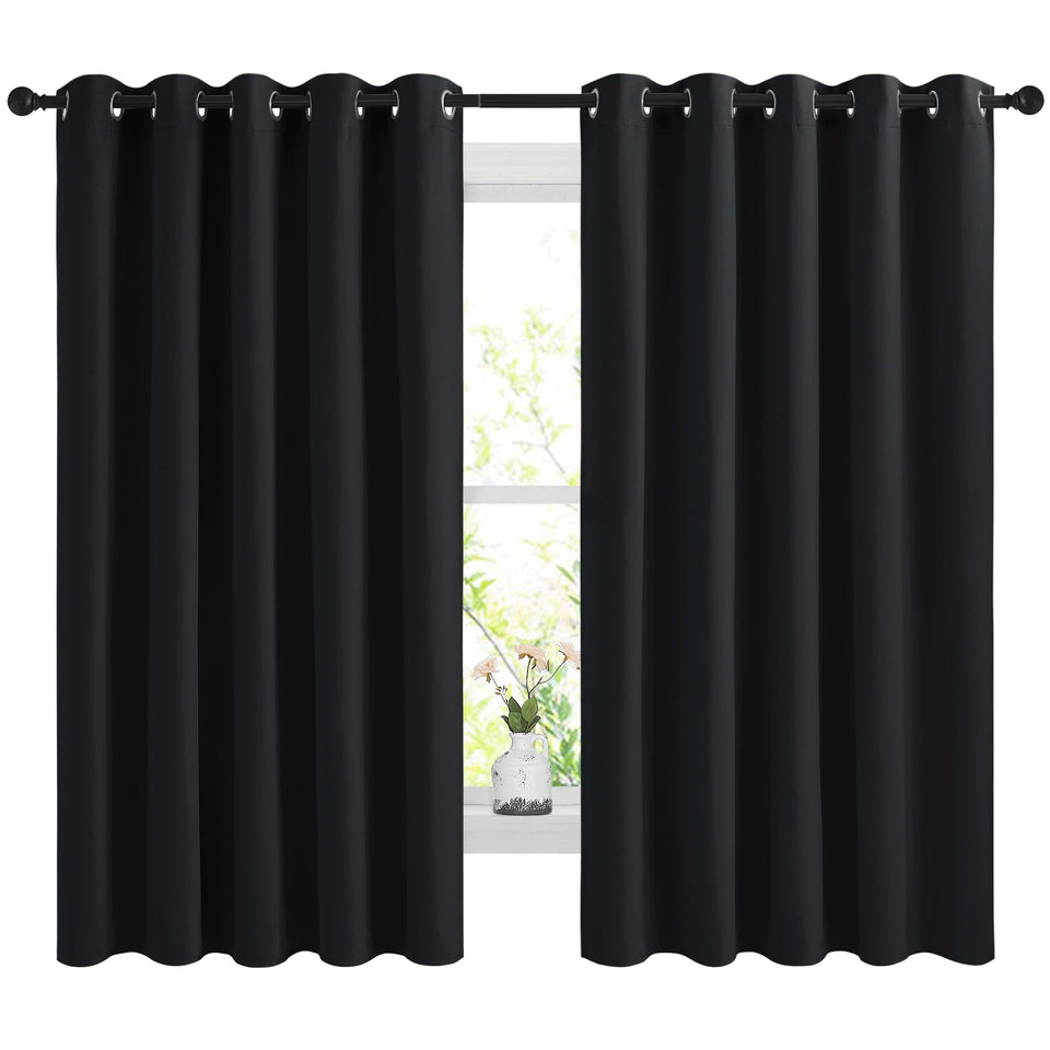 NICETOWN blackout curtains 66x60 panel set blocks light for restful mornings.
