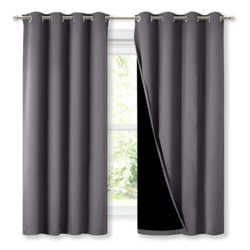 NICETOWN grey blackout curtains in a 2-panel pack, 52x63, ready to install for dark rooms.