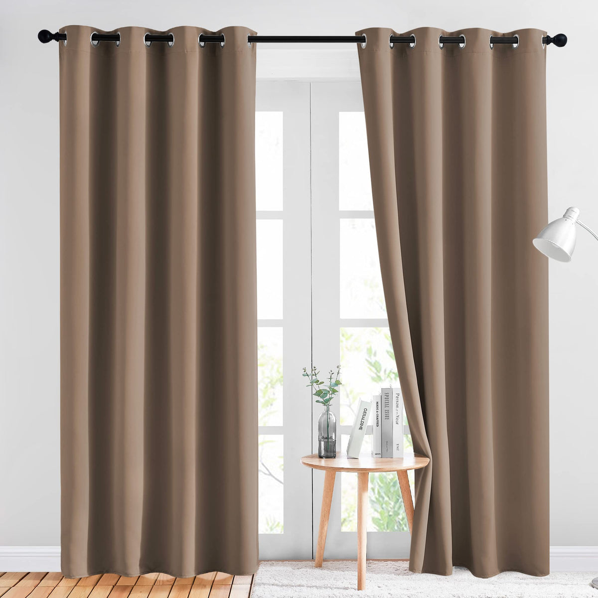 NICETOWN blackout curtain panel (52x84) in cappuccino softly blocks light for a restful bedroom.