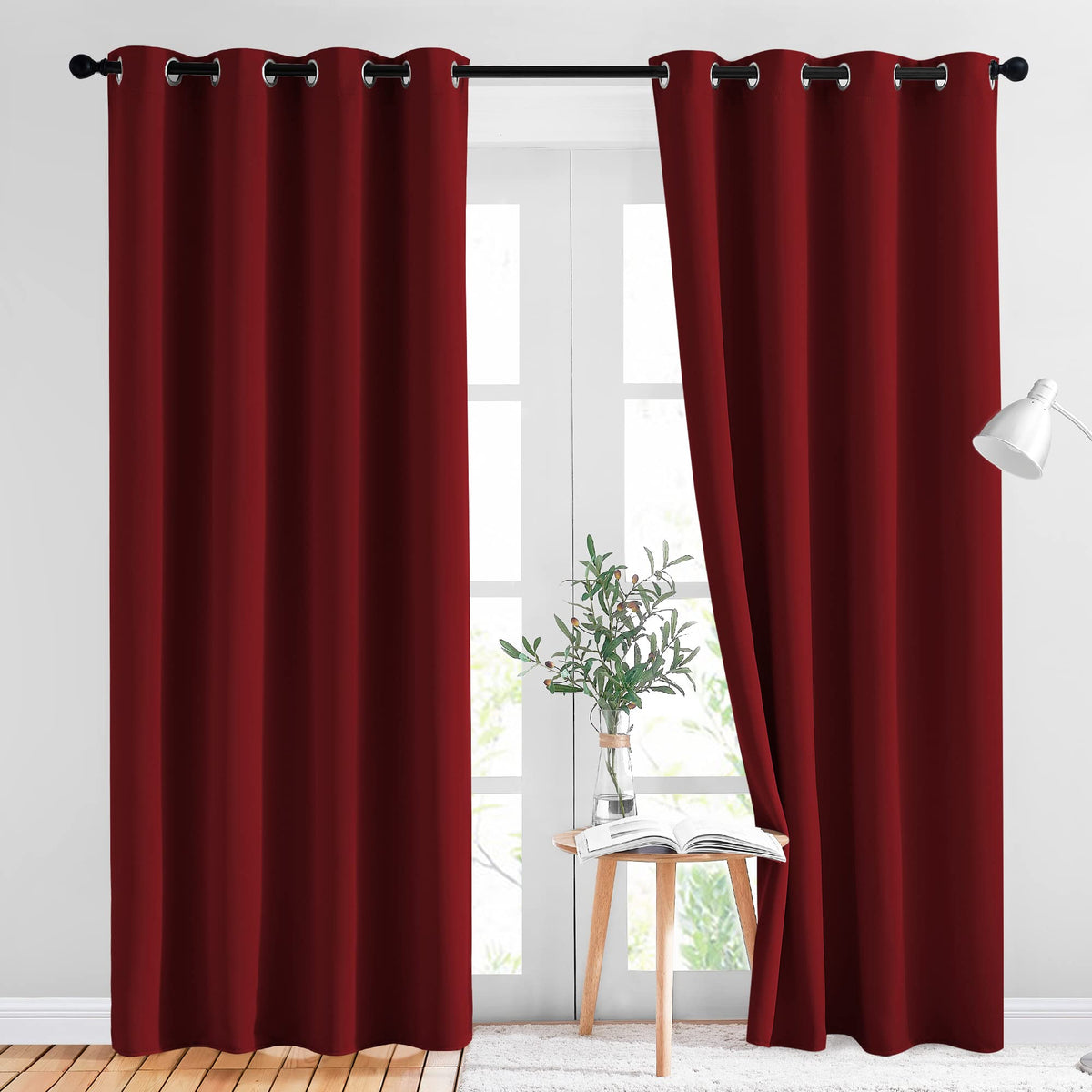 NICETOWN Burgundy blackout curtain panel with grommet top blocks light for a cozy living room