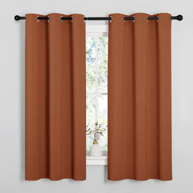 Nicetown burnt orange blackout curtains with privacy and light control in a bedroom
