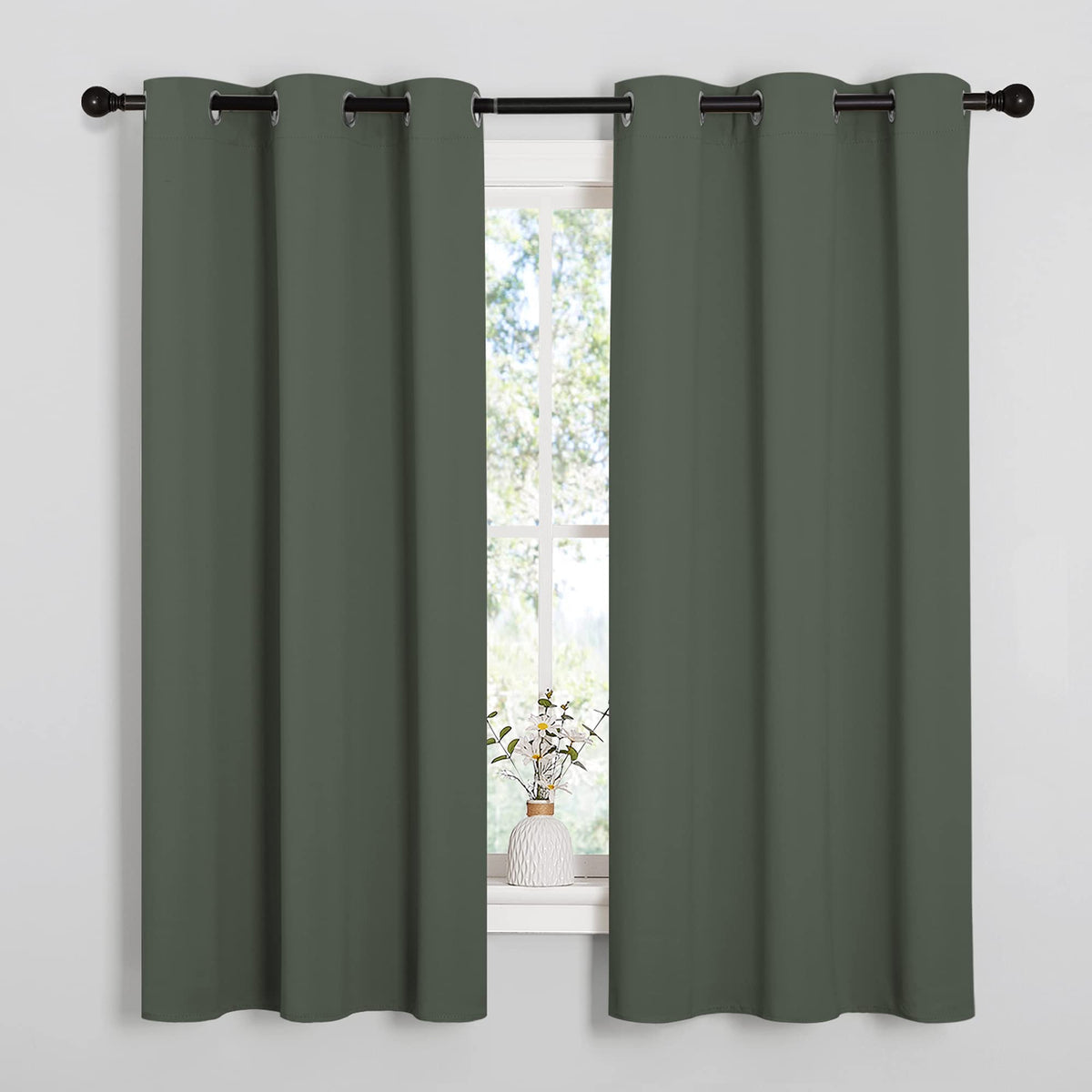 NICETOWN blackout curtain panel in Dark Mallard blocks light for cozy living spaces