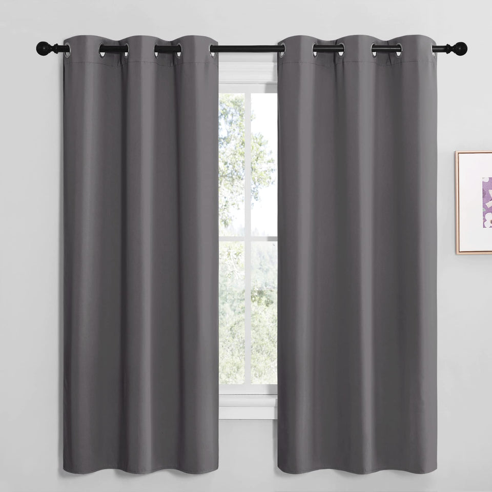 NICETOWN grey blackout curtain panel with silver grommets for privacy and light control.