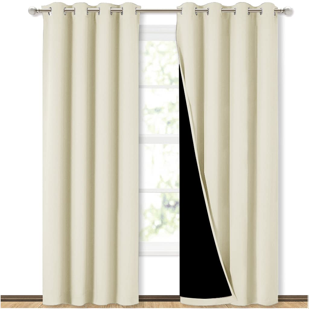 NICETOWN living room blackout drapes reduce light and noise for calmer evenings.