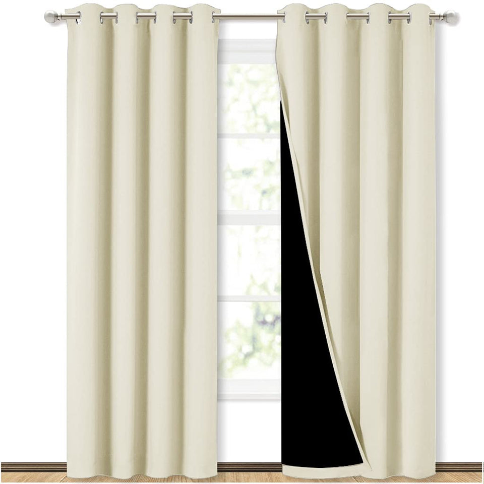 NICETOWN living room blackout drapes reduce light and noise for calmer evenings.