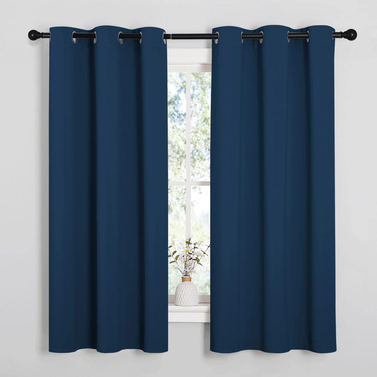 NICETOWN Moroccan Blue blackout curtain panel with grommet top enhances privacy and light control