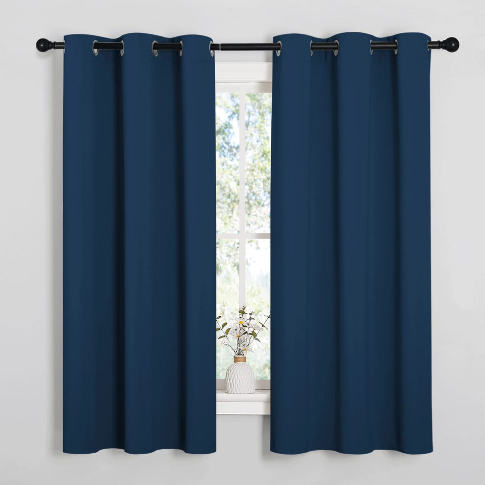 NICETOWN Moroccan Blue blackout curtain panel with grommet top enhances privacy and light control