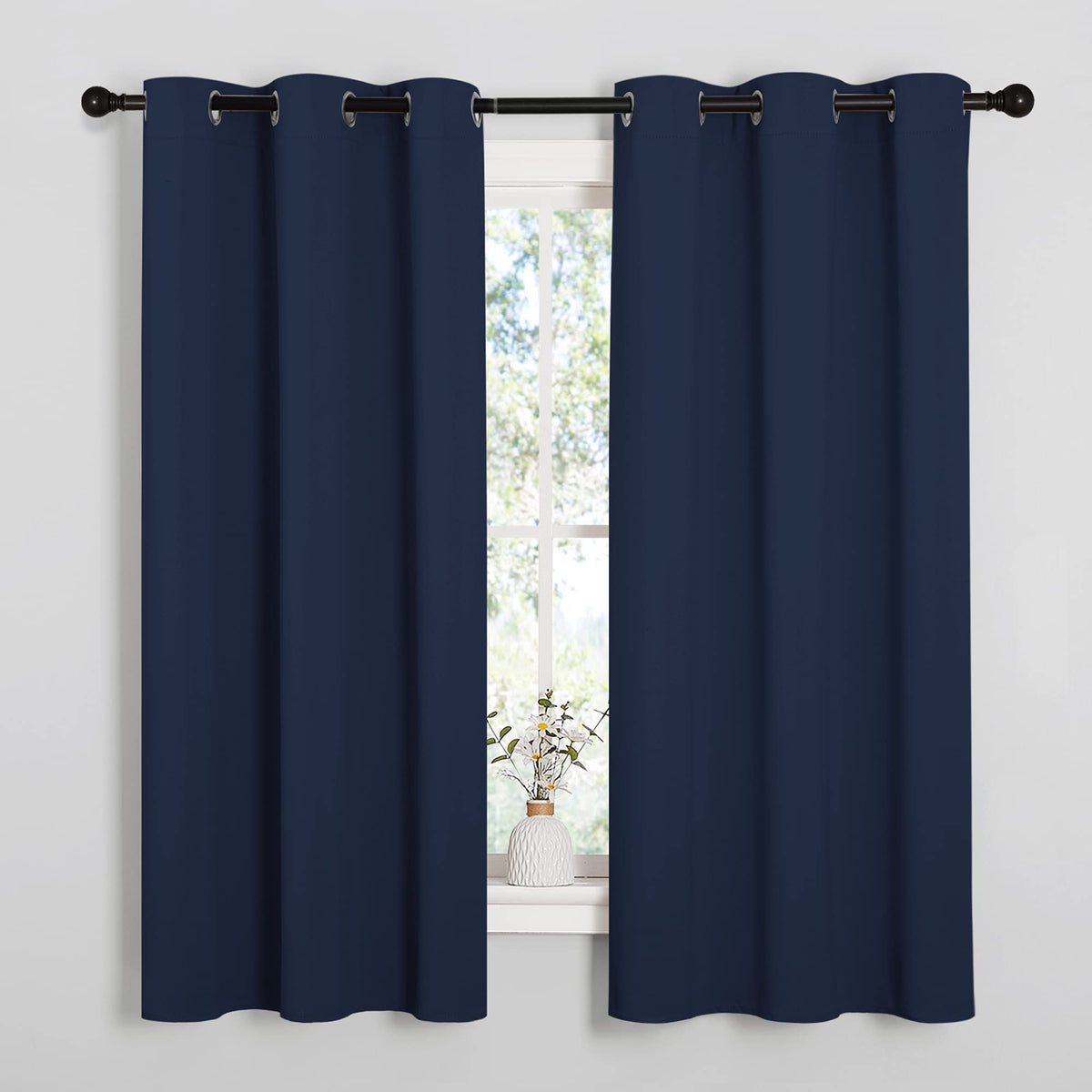 NICETOWN navy blackout curtain panel with grommet top for modern window styling and privacy