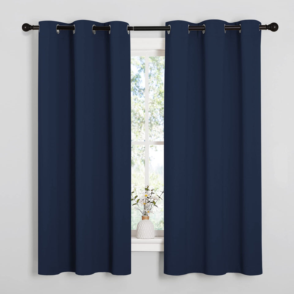 NICETOWN navy blackout curtain panel with grommet top for modern window styling and privacy