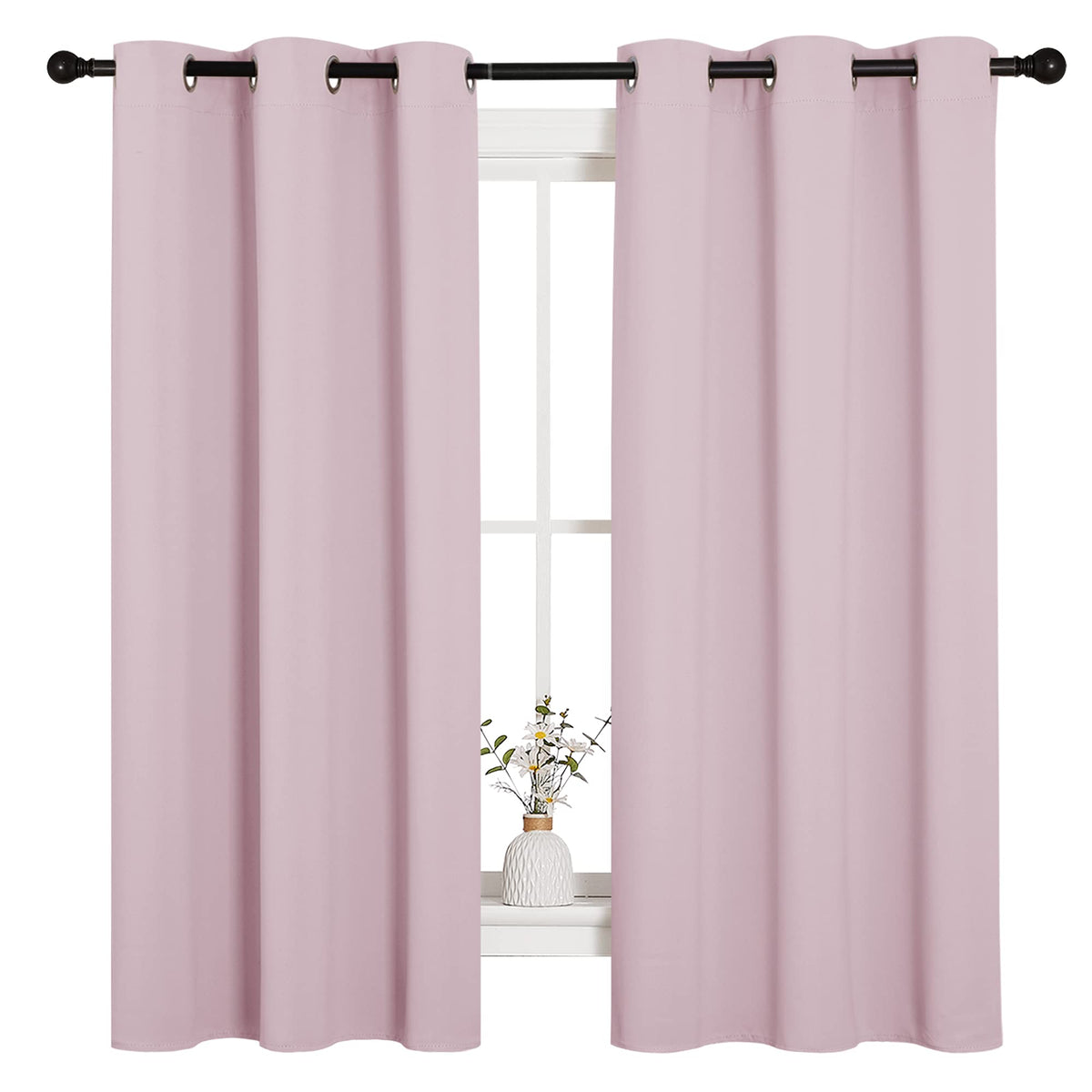 NICETOWN nursery baby-pink curtains folded, showcasing soft texture for a cozy nursery ambience.