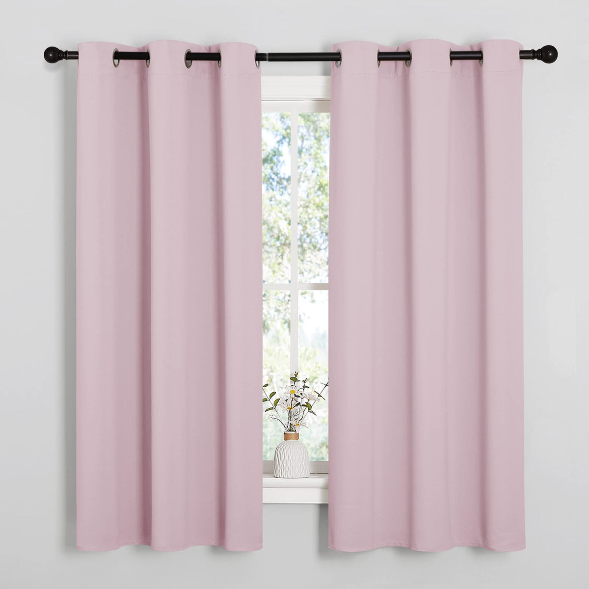NICETOWN nursery baby-pink curtains grommets ready for easy, secure hanging.