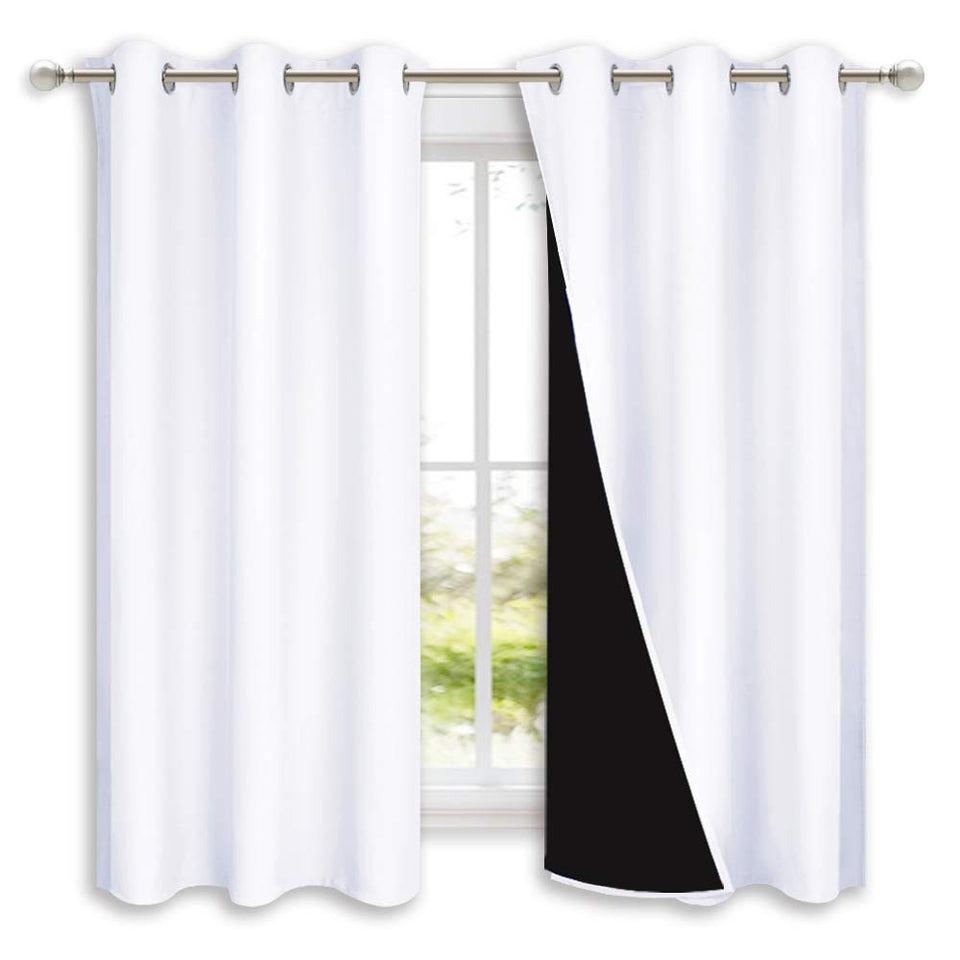 NICETOWN pure white blackout curtain panel front view offering privacy and darkness.