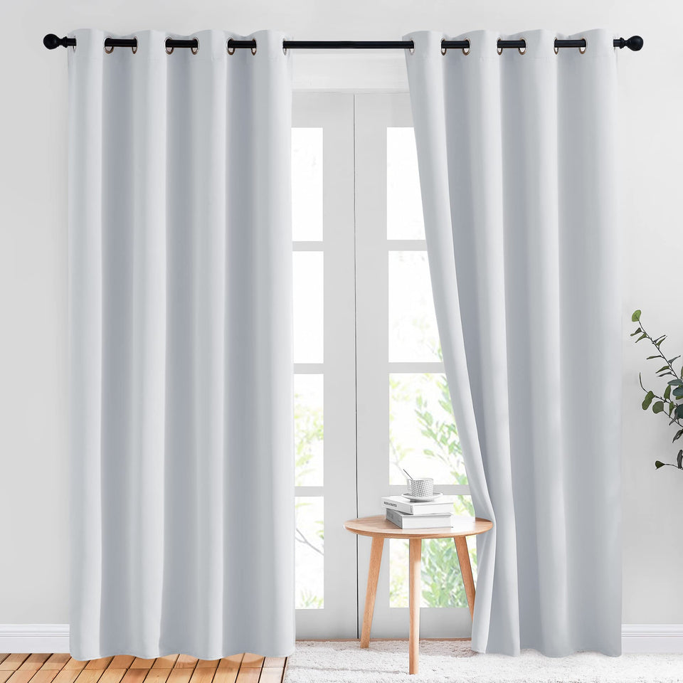NICETOWN room-darkening curtains with silver grommets; close-up shows fabric texture and light control.