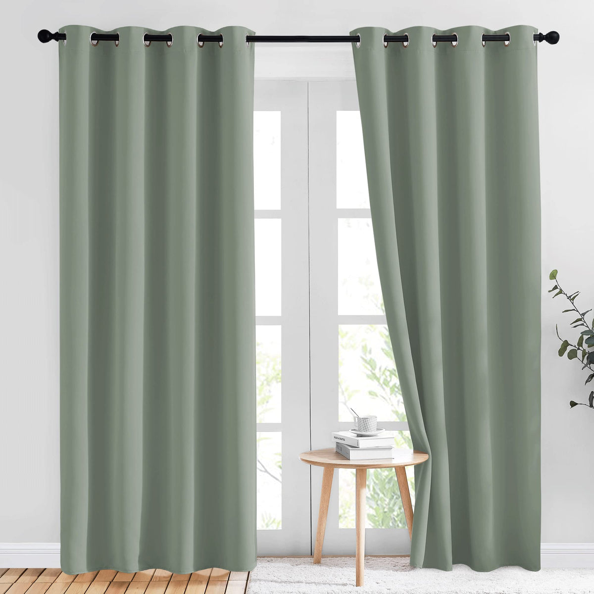 NICETOWN sage green blackout curtains in 84-inch two-panel set for a dark, restful bedroom.