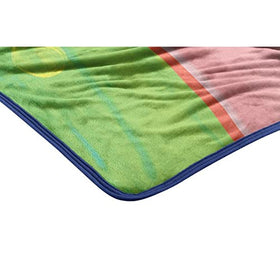 Nickelodeon SpongeBob Silky Soft Throw displayed in den for TV-watching warmth.
