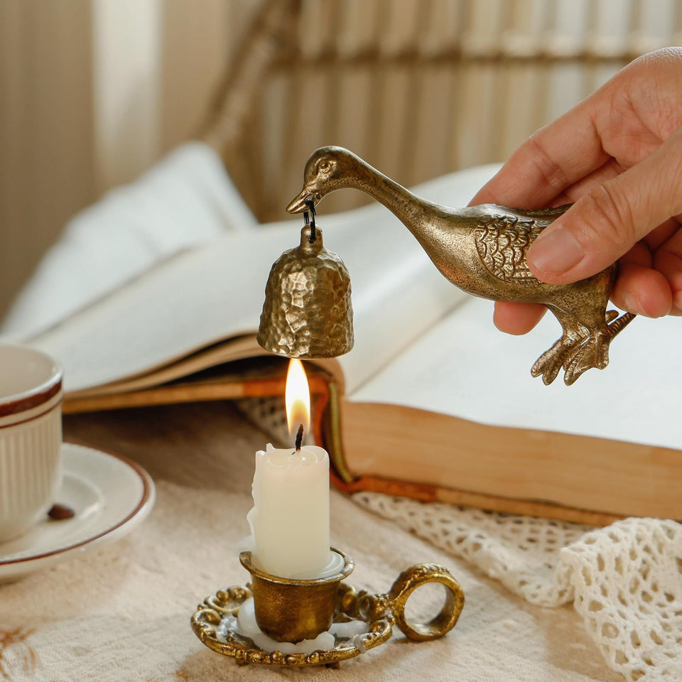NIKKY HOME gold snuffer with goose design provides elegant decor and safe flame extinguishing.