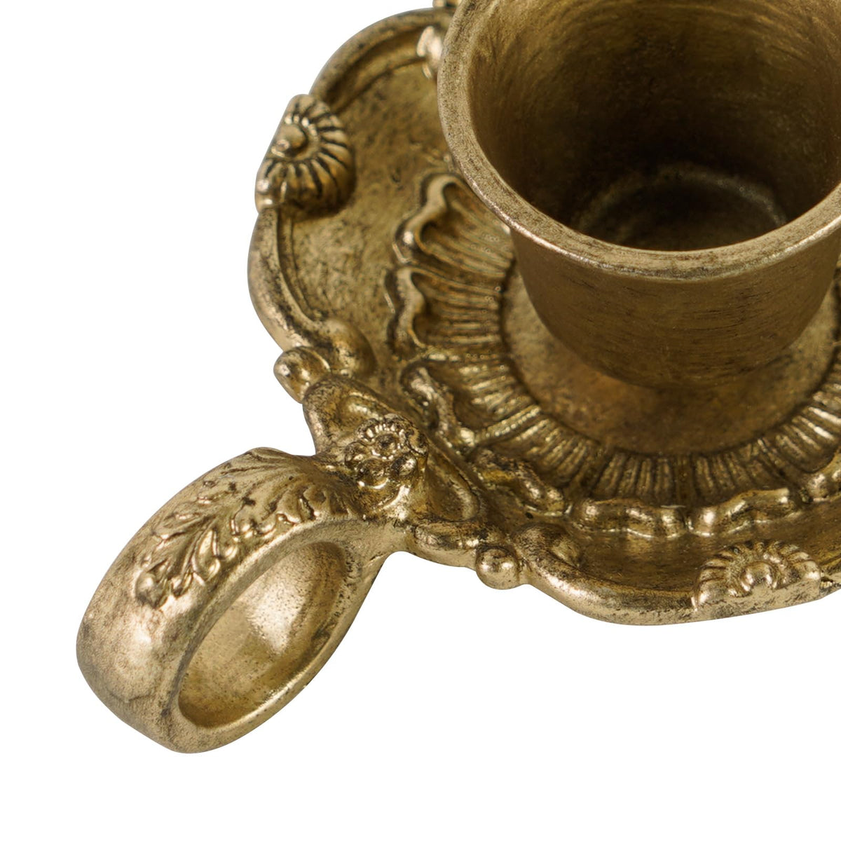 Mantel display with distressed gold candlesticks for cozy ambiance