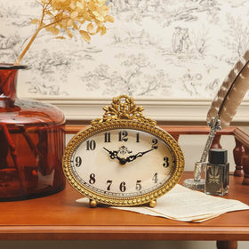 NIKKY HOME vintage tabletop clock gold dial close-up highlighting craftsmanship