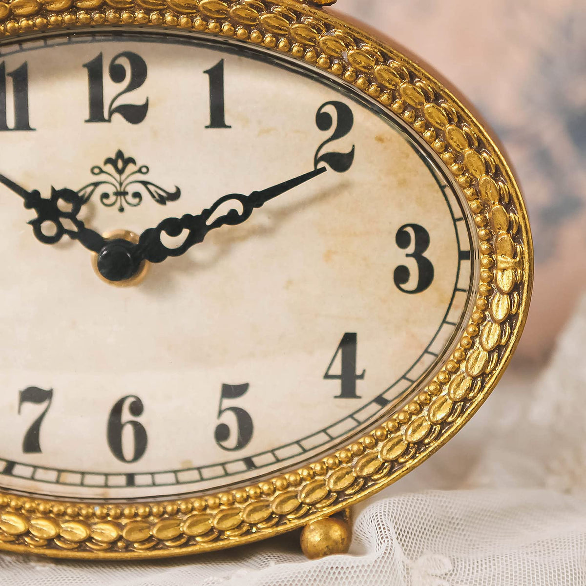 NIKKY HOME vintage tabletop clock gold on a living room shelf