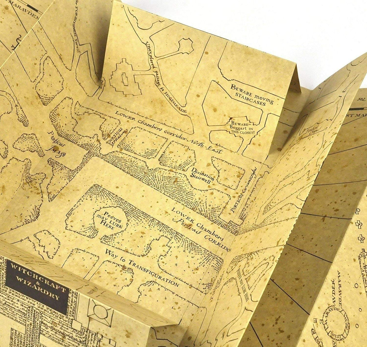 The Noble Collection Marauder's Map folded size shown 15.5 by 8.25 inches.