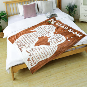 Noilfasiki blanket with inspirational words close-up highlights uplifting messages to read daily