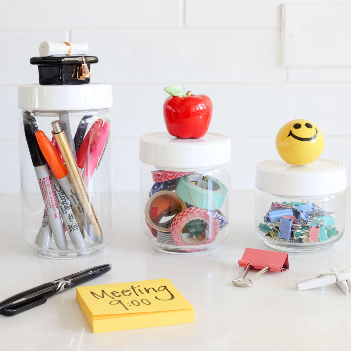 Nora Fleming hand-painted ceramic mini detail adds artisan charm.