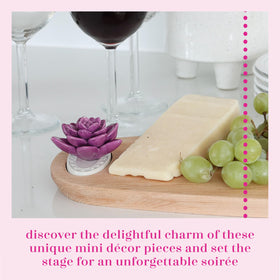 Nora Fleming hand-painted ceramic mini showcases durable, decorative spring detail.