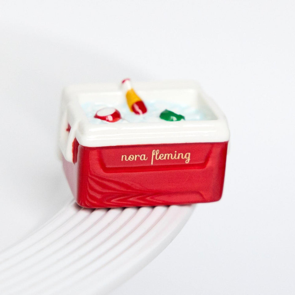 Nora Fleming Ice Cold Cooler A434 on a hand-painted mini adds seasonal charm to tabletops.