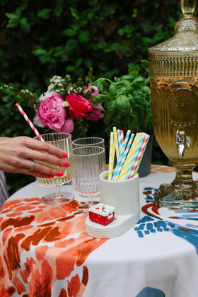 Nora Fleming ceramic mini on a base showcases durable, elegant decor for home or office.