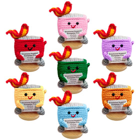 Nordkawa emotional support dumpster fire toy brightens a desk environment.