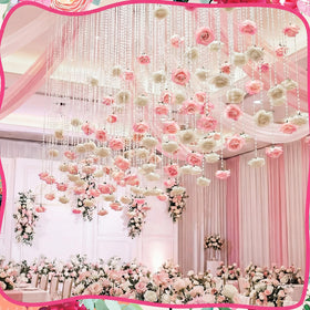 Norme rose garland in white roses creates a soft romantic glow.