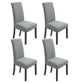 Northern Brothers dining chair covers in light grey protect chairs while refreshing decor.