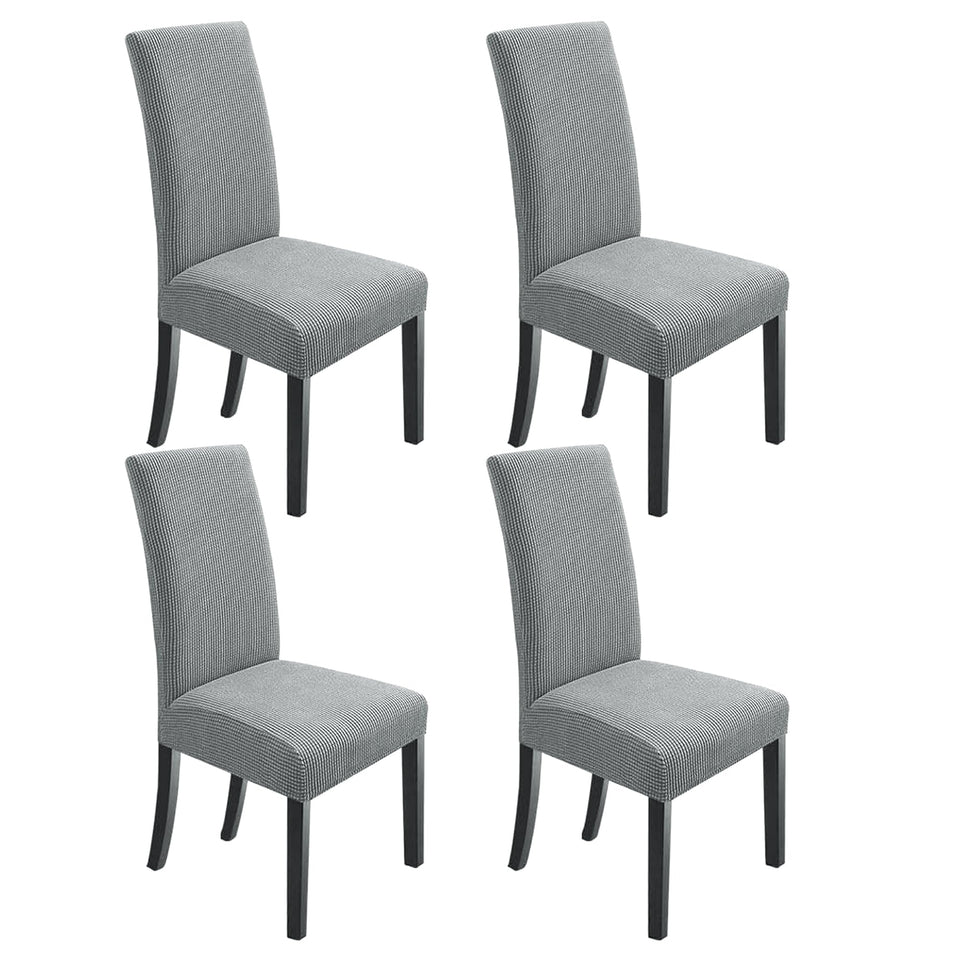 Northern Brothers dining chair covers in light grey protect chairs while refreshing decor.